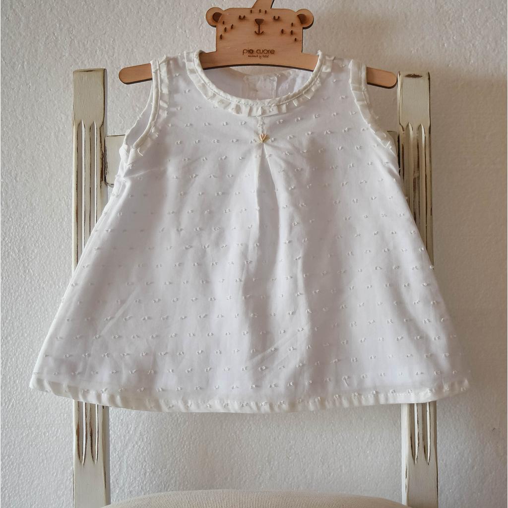 Vestido plumetti forrado con bordados a mano. Talle 6 meses